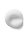 A close-up of fluffy white foaming cleanser texture.