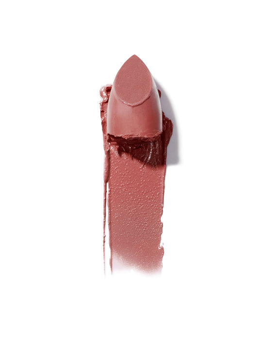 Swatch of neutral rose lipstick with creamy texture and subtle sheen.